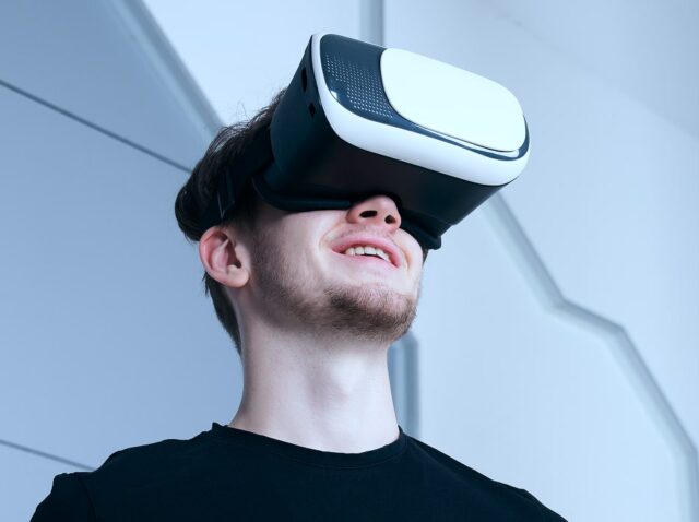 computer-scientist-wearing-vr-glasses-panicking computer-scientist-wearing-vr-glasses-panicking